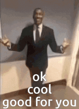 a man in a suit and tie is standing with his arms outstretched and the words `` ok cool good for you '' .