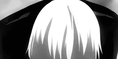 a close up of a person 's hair with a black background