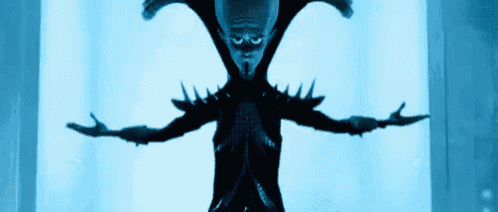 a cartoon character with spikes on his arms and a huge head