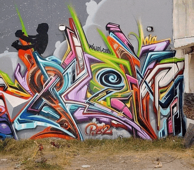 colorful graffiti on a wall that says p82
