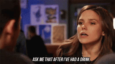 a woman is talking to a man and saying `` ask me that after i 've had a drink '' .