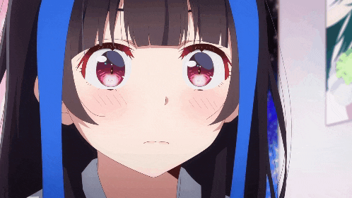 a close up of a girl with red eyes and a blue stripe in her hair