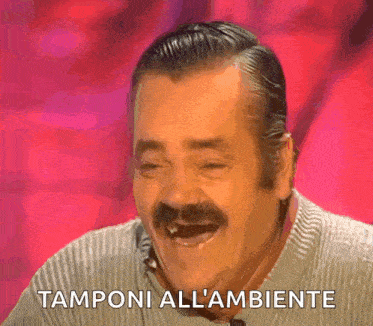 a man with a mustache is laughing with the words tamponi all l' ambiente behind him