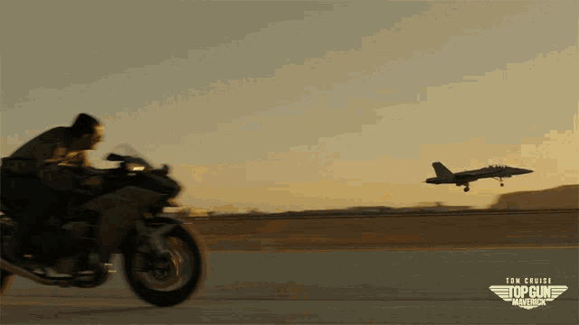 a man riding a motorcycle with the words top gun maverick on the bottom