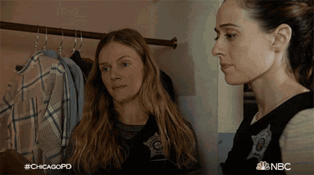 two women are standing next to each other with the hashtag #chicagopd on the bottom left