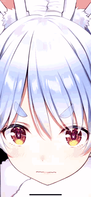 a close up of a girl 's face with blue hair
