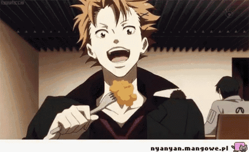 a man is eating a piece of food with a fork and knife ..