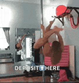 a woman is hanging from a pole with the words deposit here on the bottom