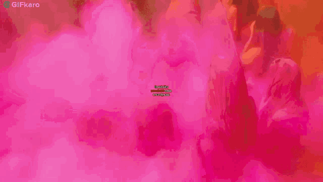 a pink background with a pink smoke coming out of it .