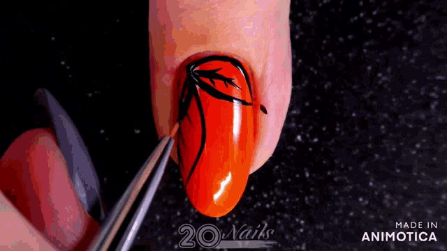 a close up of a person 's nails with the words made in animatica on the bottom