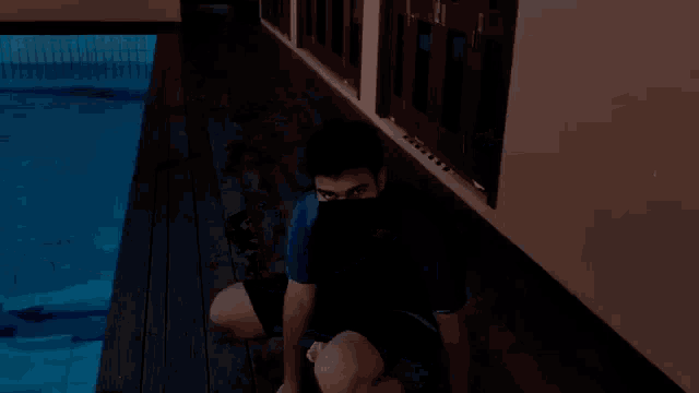a person is diving into a pool with their feet in the water