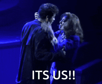 a man and a woman are hugging with the words it 's us written below them