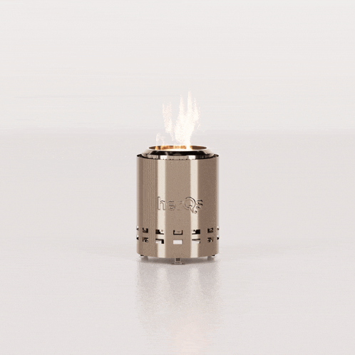 a stainless steel container with a fire inside of it