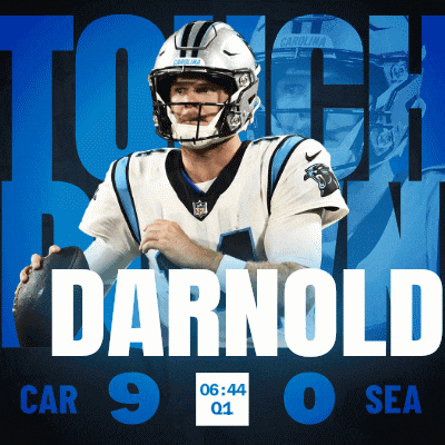 darnold is playing for the carolina panthers and is holding a football