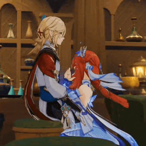 a man and a woman are sitting next to each other in a video game .