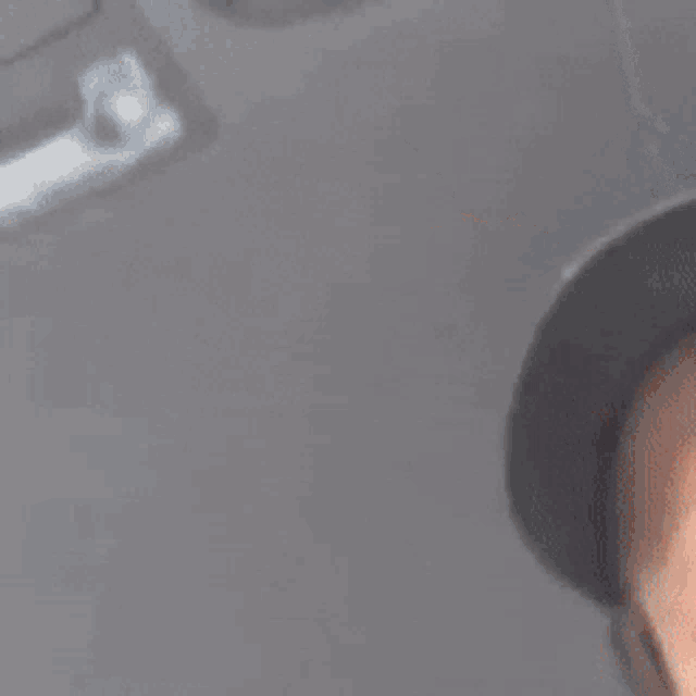 a close up of a man 's face wearing a hat .