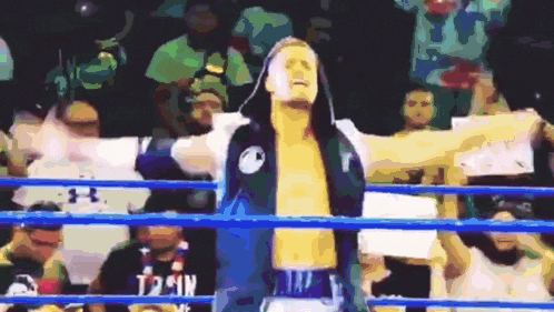 a man in a boxing ring is wearing a shirt that says t29w