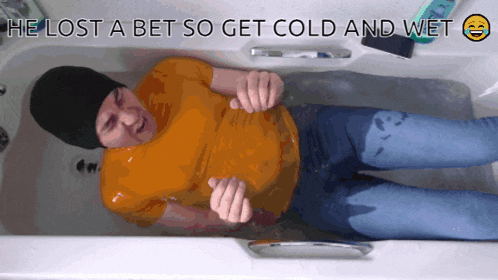 a man in a bathtub with the words he lost a bet so get cold and wet above him