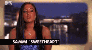 a woman in a blue dress is crying and says sammi sweetheart
