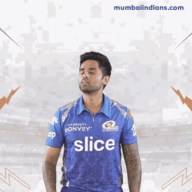a man wearing a blue shirt with the word slice on the front