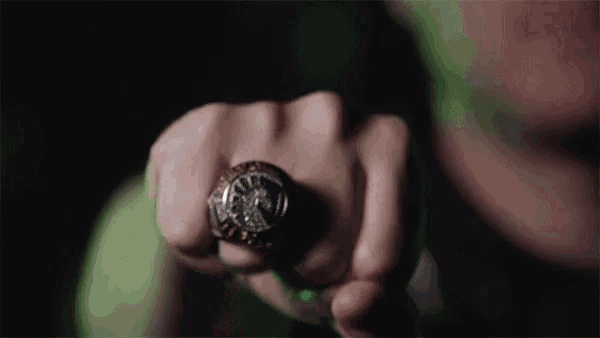a close up of a person 's hand with a ring on it that says ' i love you ' on it