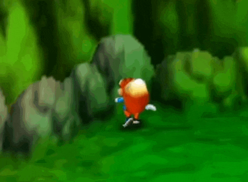 a cartoon character is running through a lush green field .