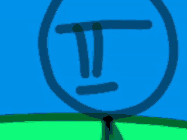 a stick figure is standing in a field with a blue circle with a t on it .