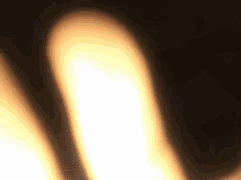 a close up of a light bulb with a dark background