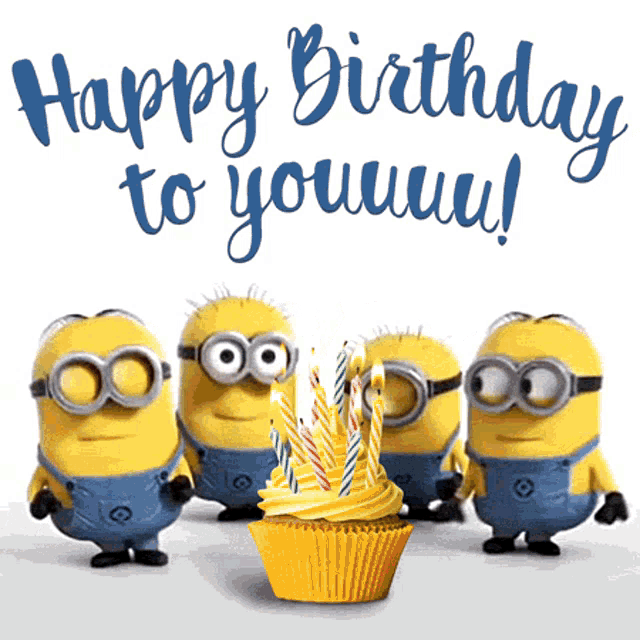 a group of minions standing around a cupcake with candles and the words happy birthday to youuuu