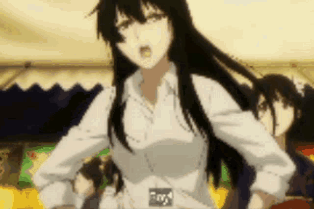 a girl with long black hair and a white shirt is standing in a crowd .