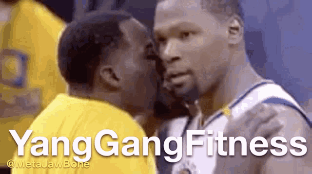 a basketball player is kissing another player on the cheek with the words yanggangfitness written above them