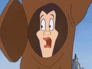 a cartoon character with a surprised look on his face is standing in a hole in a tree trunk .