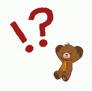 a brown teddy bear is sitting next to a red question mark