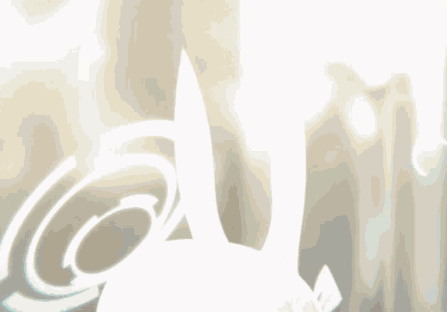 a close up of a cartoon character 's ears with a blue circle around them