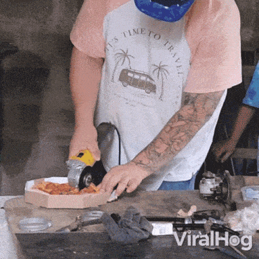 cutting-pizza-with-a-tool-viralhog.gif