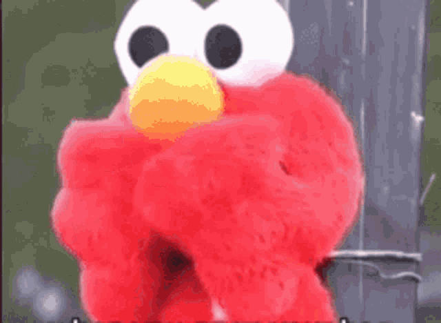 Elmo Disintegrate GIF - Elmo Disintegrate Melt GIFs