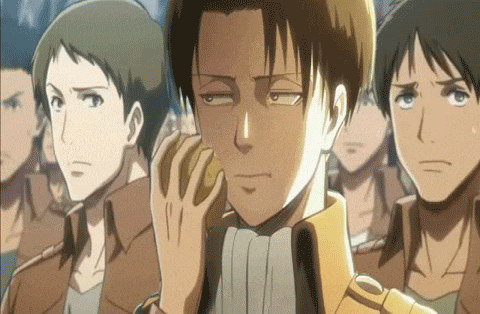 a group of anime characters are standing next to each other and one of them is holding a sandwich in his hand .