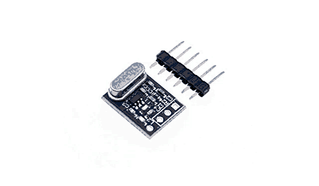 a small blue electronic device with a chip and a bunch of connectors