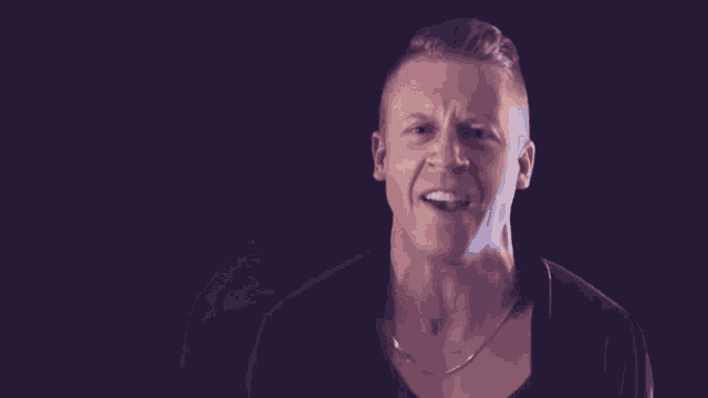 a blurry picture of a man in a black shirt