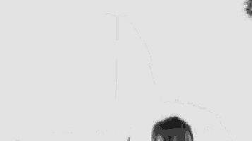 a black and white photo of a man screaming and saying `` you got knocked the fuck out '' .
