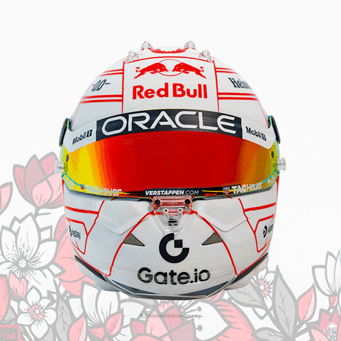 a red bull oracle helmet with a gate.io logo on it