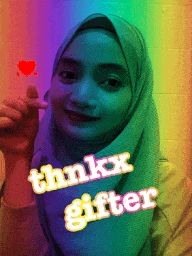 a woman wearing a hijab is holding a heart and the words thinkx glitter are behind her