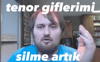 a man with a beard is wearing a blue shirt with the words tenor giflerimi silme artik on it