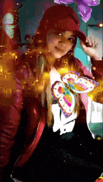a woman wearing a red hat and a black shirt with the letter n on it is surrounded by butterflies