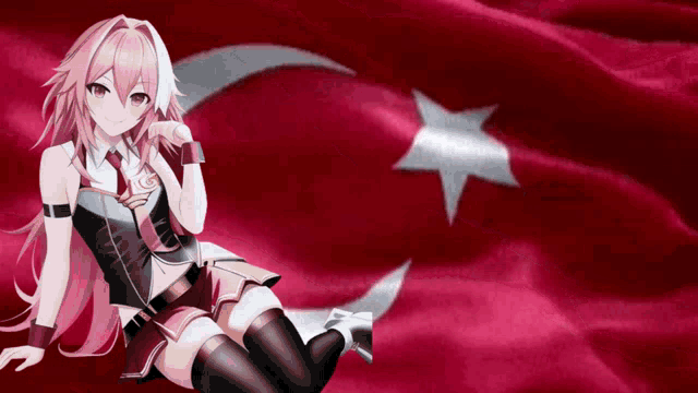 a girl with pink hair sits in front of a red flag
