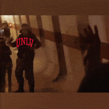 a blurred image of a group of people with the word only in red letters