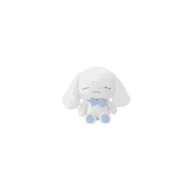 a white stuffed animal with a blue bow tie is sitting on a white background