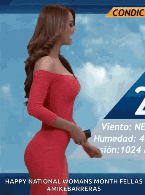 a woman in a red dress is standing in front of a weather forecast