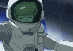 a person in a space suit with a green face
