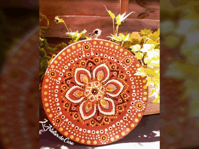 a circle with a flower on it and the words z atelier do core on the bottom